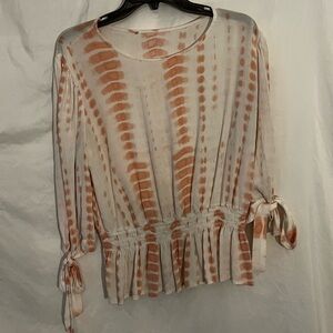 pink and white long sleeve blouse. no tags. I believe it’s a medium.